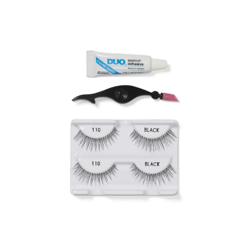 Eyelash set with adhesive and applicator on a white background