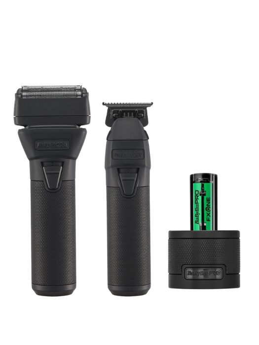 Set of grooming tools including a shaver, trimmer, and battery pack on a white background