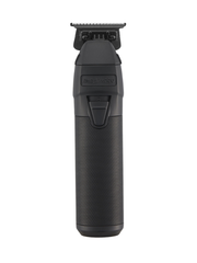 Black grooming trimmer on a white background