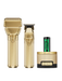 Set of gold grooming tools including a razor, trimmer, and canister on a white background
