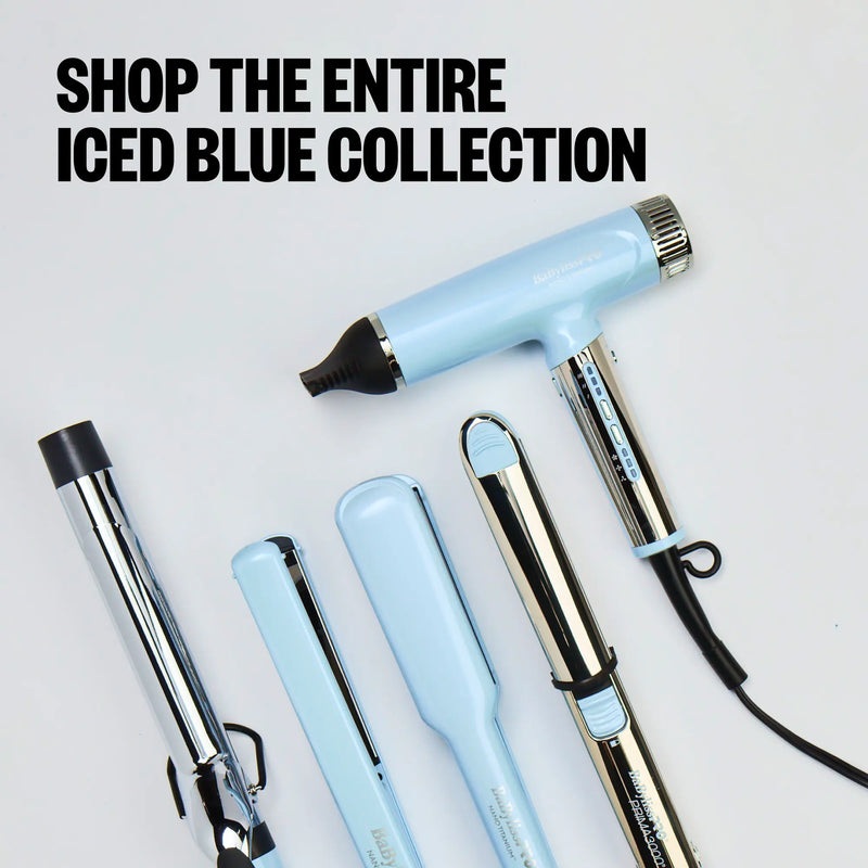 Set of hair styling tools with iced blue handles on a light gray background