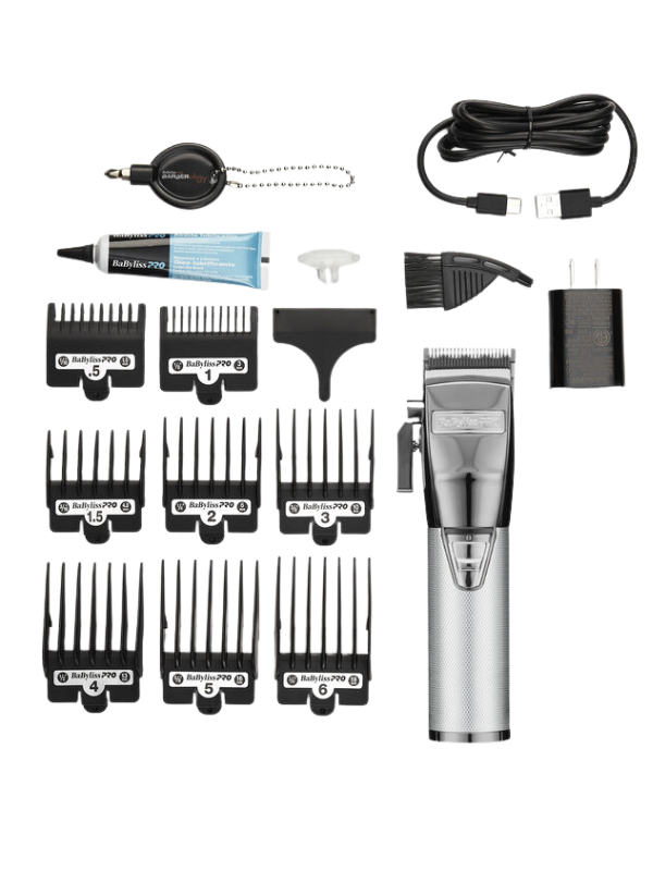 Hair trimmer set with attachments and cable on a white background