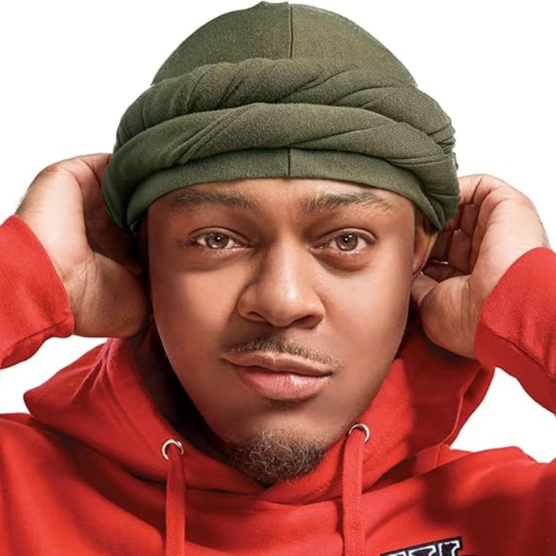 Person wearing a red hoodie and olive hair turban against a white background