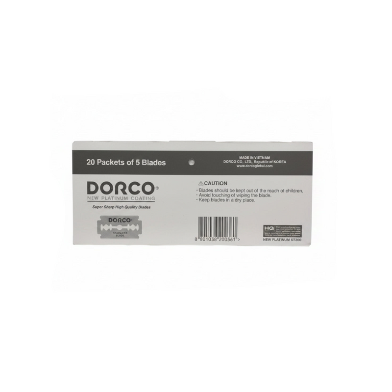 Box of Dorco razor blades with branding and product details on a white background