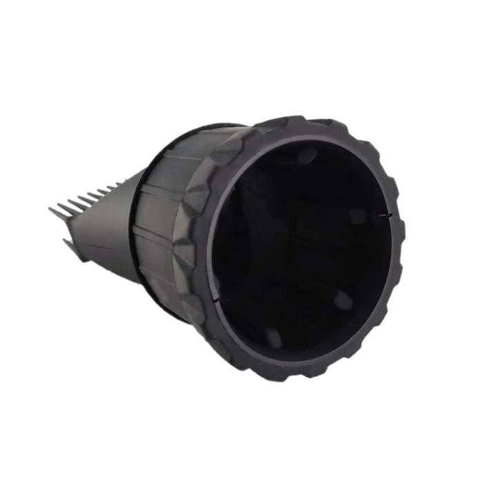 Black plastic fitting with textured surface on a white background