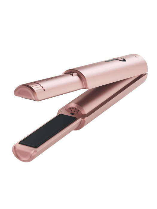 Rose gold hair straightener on a white background
