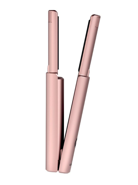 Rose gold hair straightener on a white background