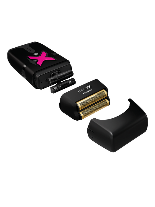 Electric shaver with gold foil and black handle on a white background