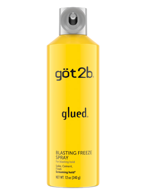 Yellow bottle of got2b glued blasting freeze spray on a white background