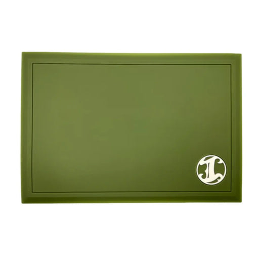Green barber station mat with a white "I" Logo on a white background
