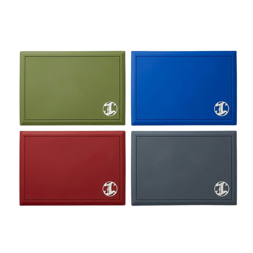 Four rectangular barber station mats in green, blue, red, and black with a logo in the corner on a white background.
