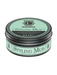 Jar of styling mud with a green label on a white background