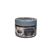 Jar of 'Creative' product with decorative label on a white background