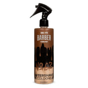 Brown bottle of Marmara Barber aftershave cologne number 63 on a white background