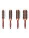 Set of four hairbrushes with varying bristle densities on a white background