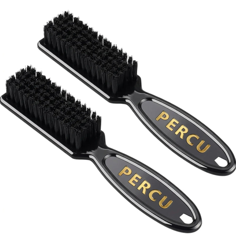 Two black grooming brushes with black bristles and gold PERCU branding on the handles, shown on a plain white background.