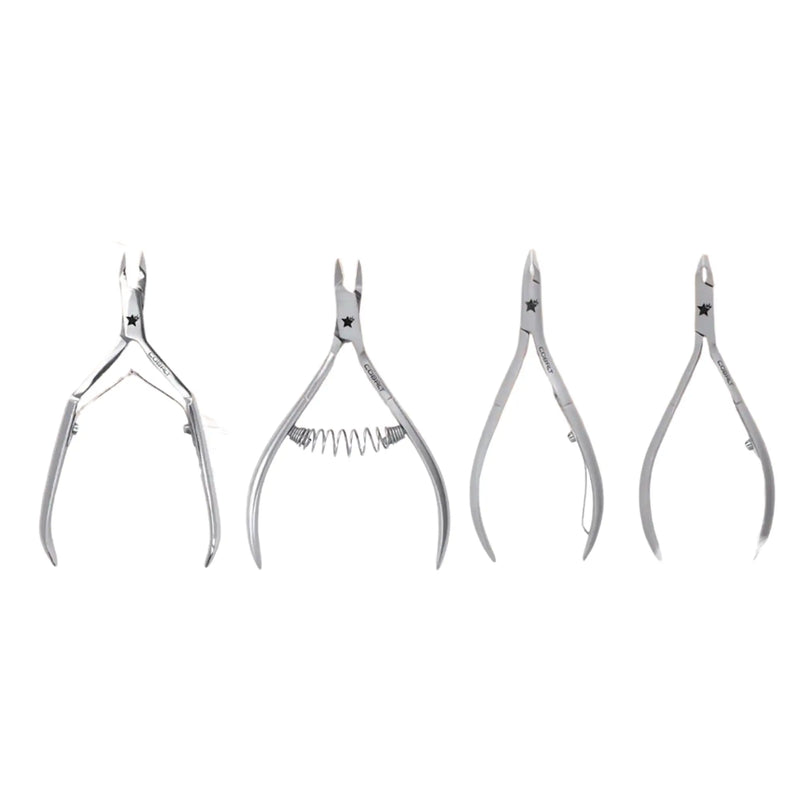 Set of four pairs of silver cuticle nippers on a white background