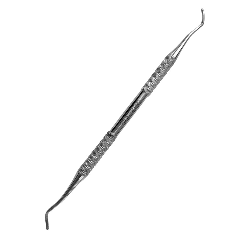 Double sided nail curette on white background