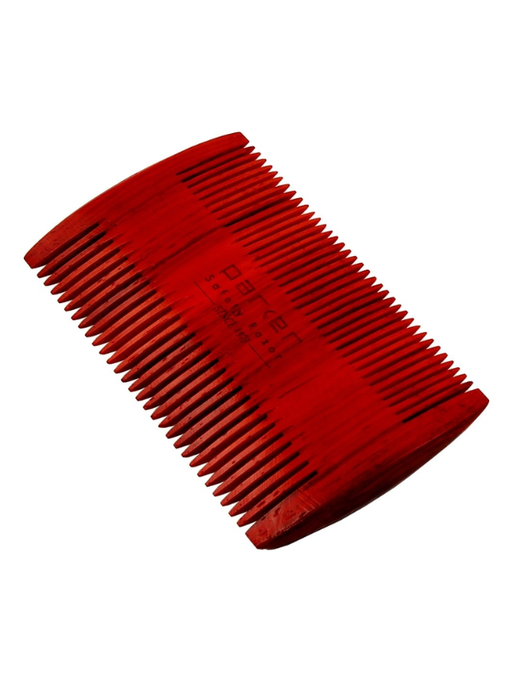 Red Double sided comb on a white background