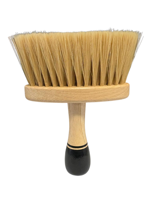 Brush with wooden handle and bristles on a white background