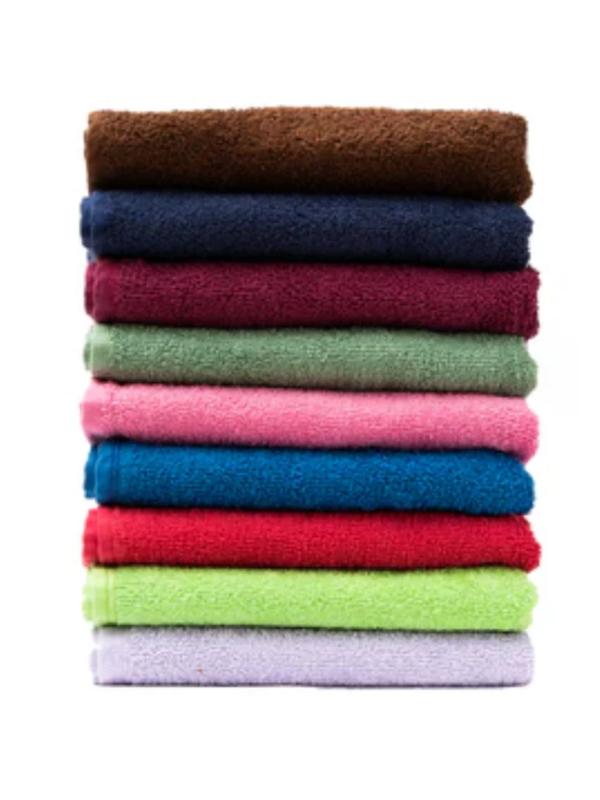 Stack of colorful folded towels on a white background