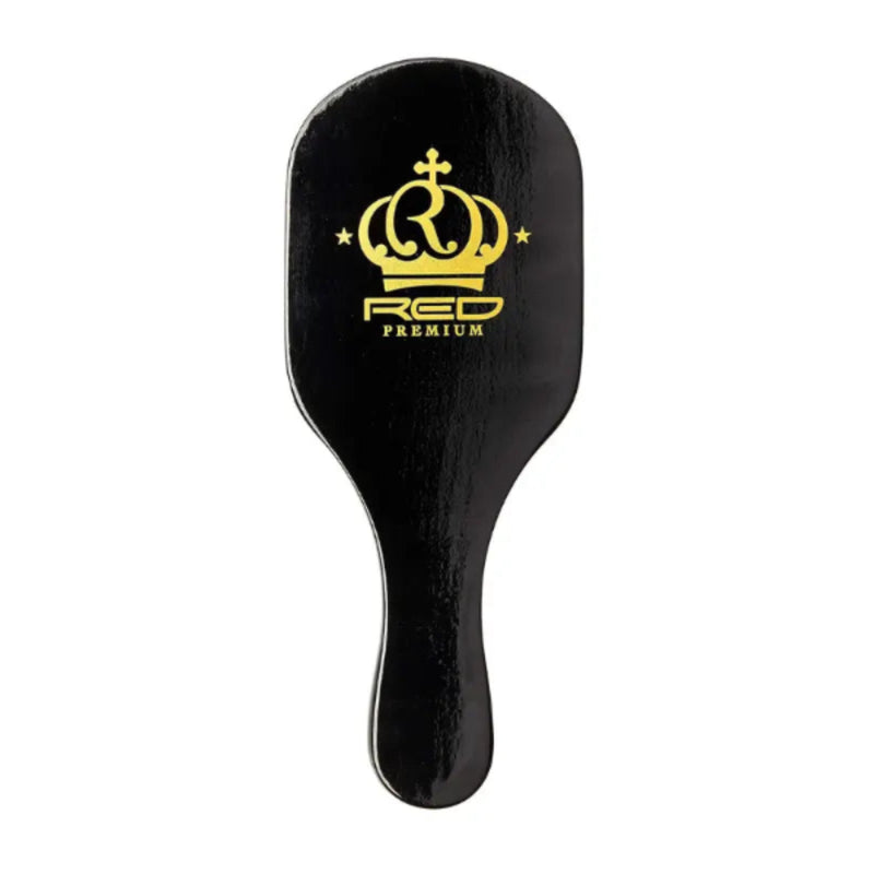 Black hairbrush with gold logo on a white background