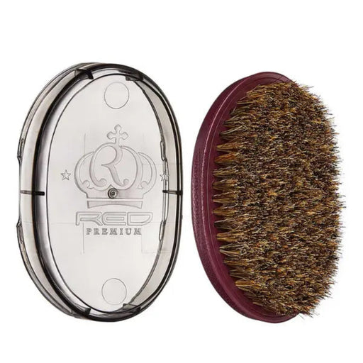 Beard brush with bristles and clear case on a white background