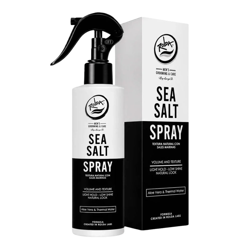 Sea salt spray bottle and packaging on a white background