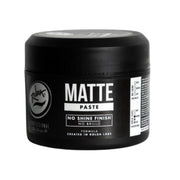 Black jar of matte paste with visible branding on a white background