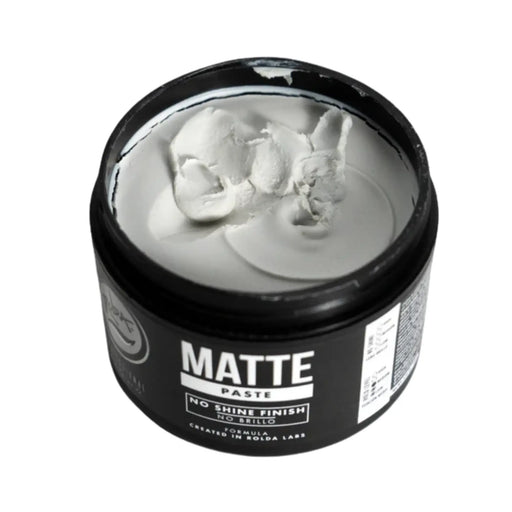 Jar of matte paste with a black lid on a white background