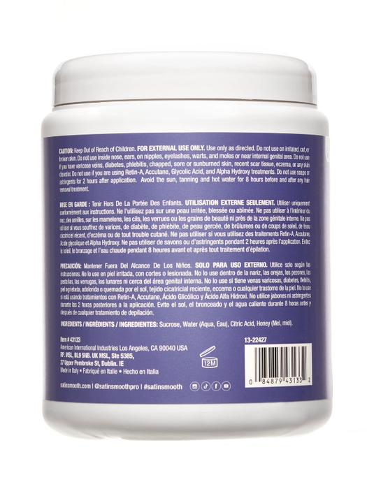 Back label of a white container with text and a barcode on a white background