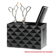 Black deluxe shear holder storage box holding shears and a comb on a white background