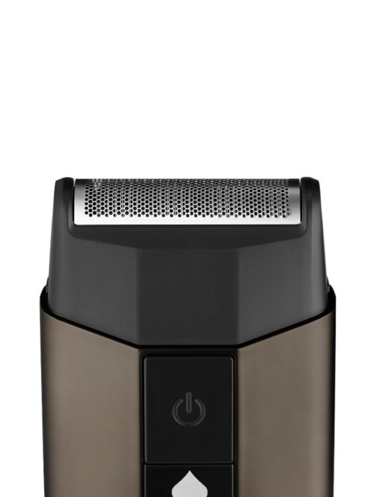 Close-up of a black electric shaver on a white background