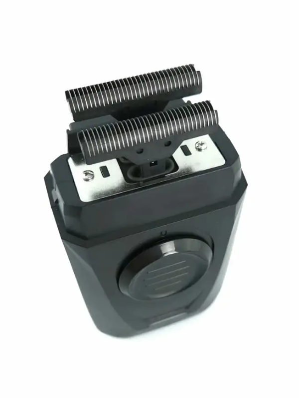 Black electric shaver on a white background