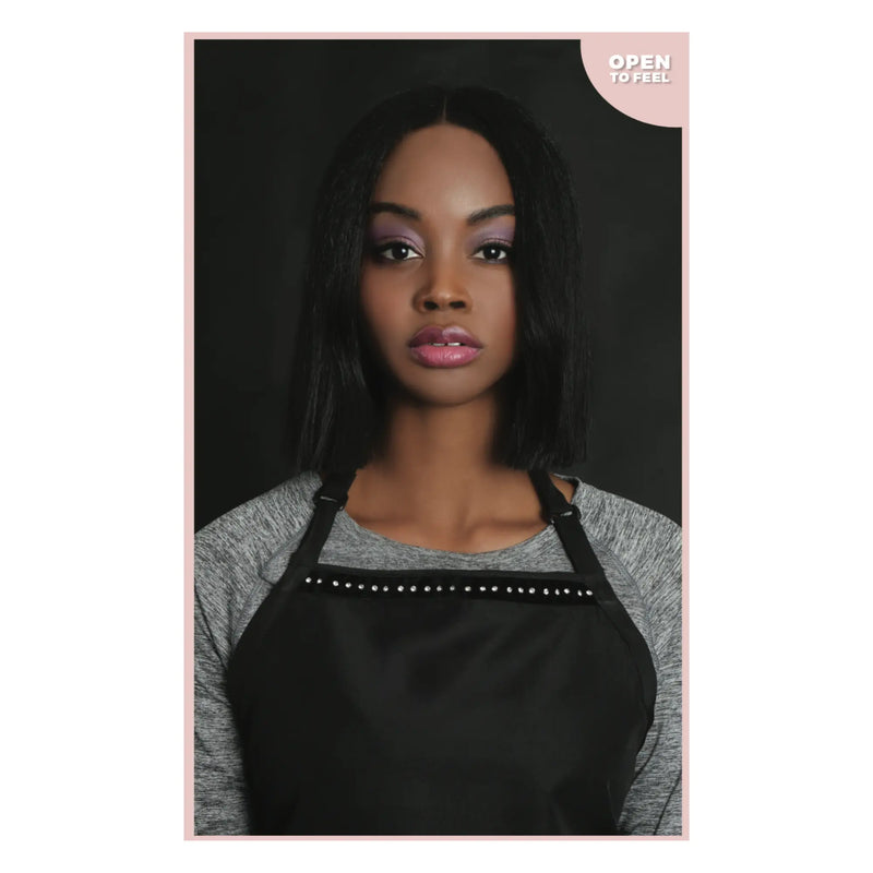Packaging of the styletek black bleach-proof apron with rhinestones on a white background 