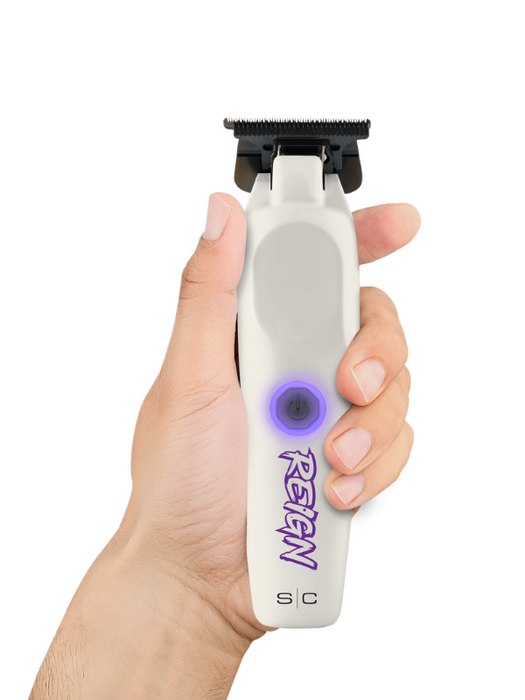 Hand holding a white electronic device with purple branding on a white background