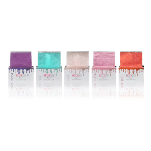 Five open hair coloring foil sheets in purple, teal, champagne, pink, and coral shades, arranged in a row on a white background.