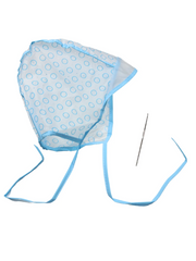 Blue polka dot bonnet with a needle on a white background