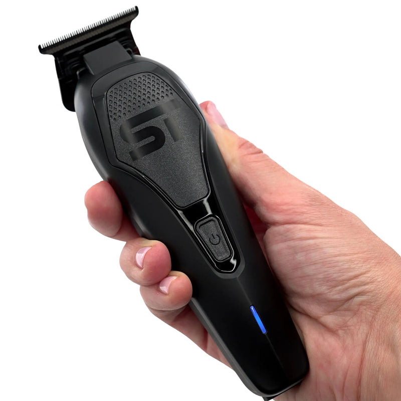 Supreme Trimmer Black hair trimmer with ST brand logo displayed in hand on a white background