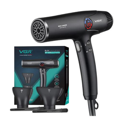 Black hair dryer with attachments and packaging on a white background