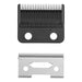 Two hair clipper blades, one black and one silver, on a white background.