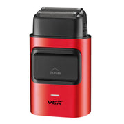 Red and black VGR shaver on a white background