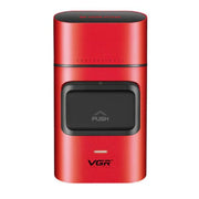 Red electronic device with black push button on a white background
