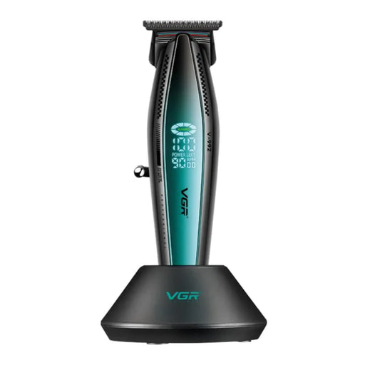 Black and green vgr trimmer on charging base on a white background