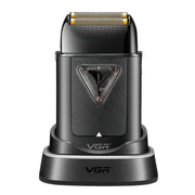 VGR black shaver placed on charging base on a white background