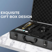 Black gift box with grooming tools on a marble surface and blue background