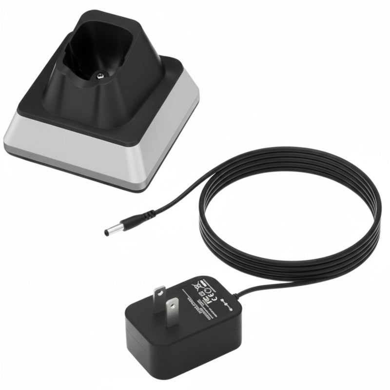 A black and silver charging dock with a coiled black power cable and a black wall charger 