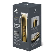 Andis BNY7 Professional cordless clipper in a metallic gold finish, shown in its dark gray retail packaging box against a white background.