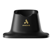 A black plastic stand with a gold logo and the brand name 'ANDIS' printed on the front, set against a plain white background.