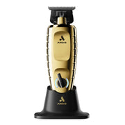Gold ANDIS hair clipper on a white background